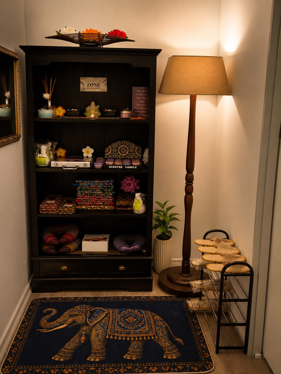 Spa retail nook Retail nook with scented candles, Thai cushions, slippers and an elephant rug