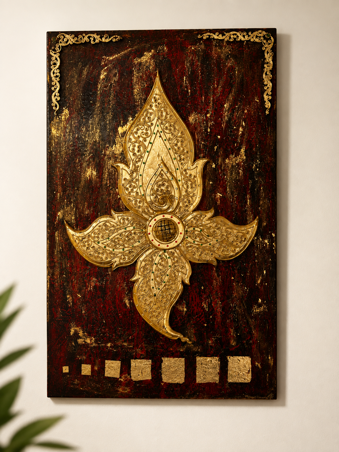 Thai lotus wall art Ornate golden Thai lotus motif carved and gilded on a dark red wooden wall panel with traditional corner flourishes
